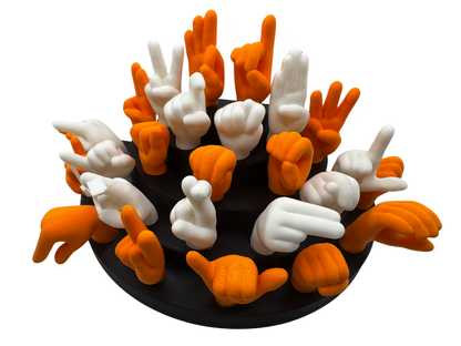 Set of orange and white hand gesture figures on a black base
