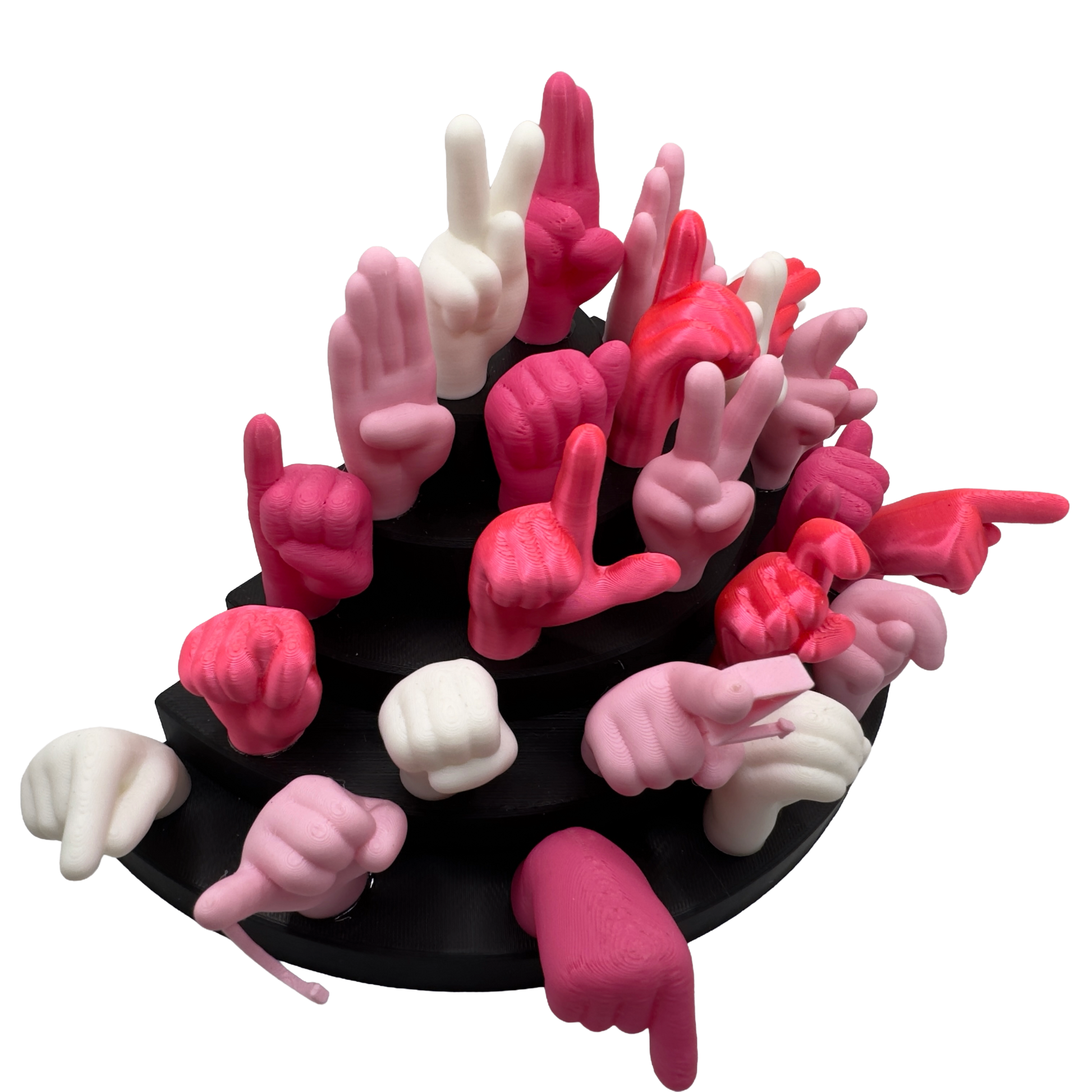 Set of pink, magnet and white hand gesture figures on a black base