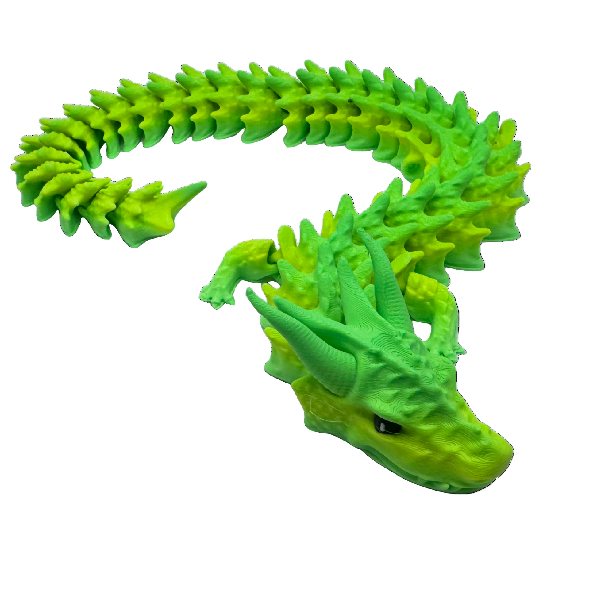 Green/Yellow dragon toy figure on a white background