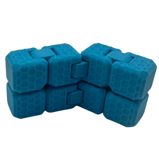 Blue cube fidget on a white background